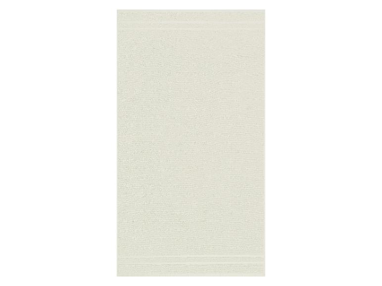 Ein hellgrünes Handtuch mit glatter Oberfläche.