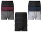 Schwarze, graue und blaue Boxershorts.
