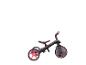 Schwarz-rosa Kinderdreirad mit drei Rädern und Pedalen.