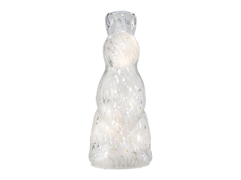 Tischlampe aus Klarglas mit weißem Spiralmuster.