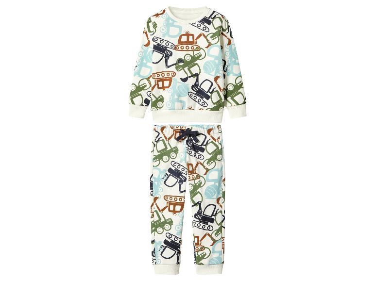 Kinder-Set aus Langarmshirt und Hose mit Baumaschinen-Motiv.
