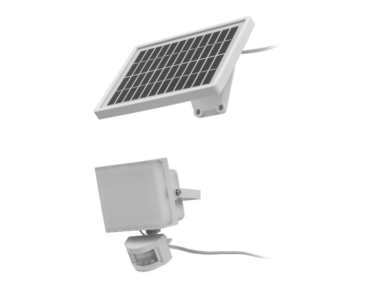 Weißes Solarpanel und LED-Flutlicht mit Bewegungssensor