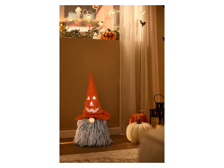 Dekorativer LED-Halloween-Wichtel mit leuchtendem Kürbishut.