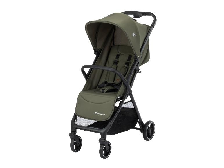 Grüner Kinderwagen mit schwarzem Gestell und Rädern, mit Sicherheitsgurten.