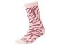 Rosa Socke mit dunkelroten Zebrastreifen.