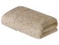 Beige Handtuch, gefaltet.