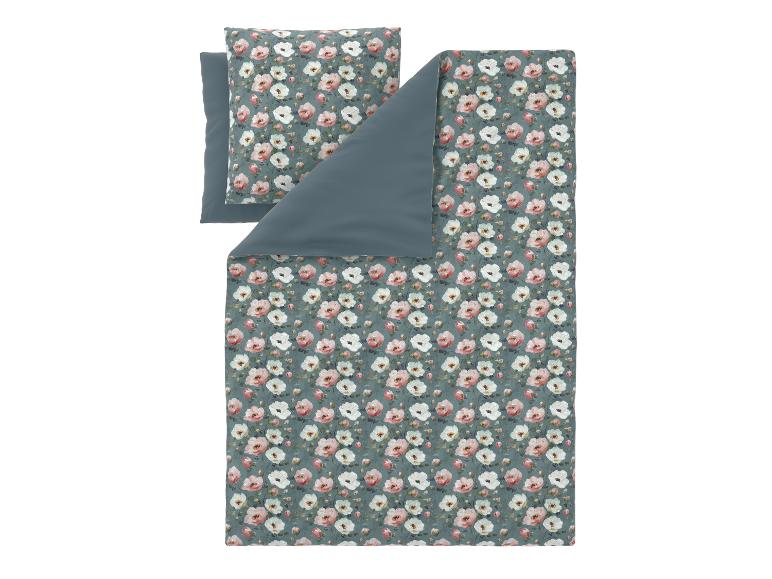 Bettwäsche-Set mit rosa und weißem Blumenmuster.