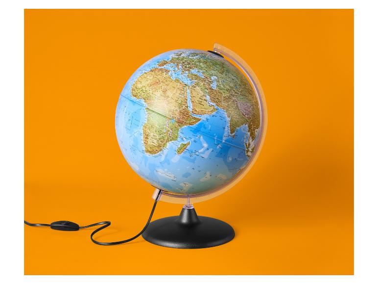 Beleuchteter Globus auf orangefarbenem Hintergrund, mit Afrika und Asien.