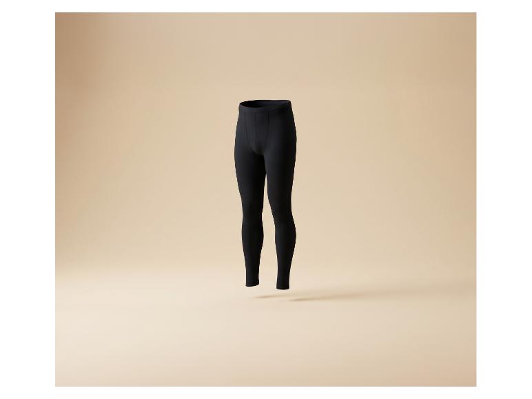 Schwarze Herren-Leggings oder Unterhose auf beigem Hintergrund.