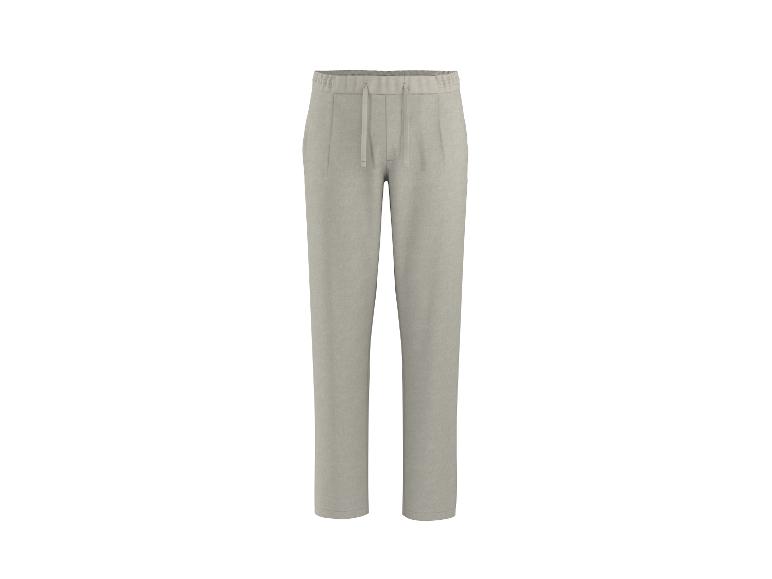 Hellbeige Jogginghose mit Kordelzug an der Taille.