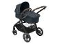 Maxi-Cosi Kinderwagen mit einem dunkelblauen Babywannenaufsatz.