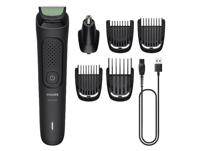 Philips All-in-One Trimmer mit verschiedenen Aufsätzen und Ladekabel.