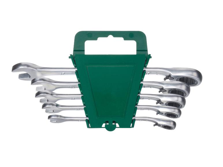 Satz Ratschenschlüssel in grüner Halterung.