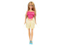 Barbie-Puppe mit rosa Top mit weißen Punkten und gelber Hose.