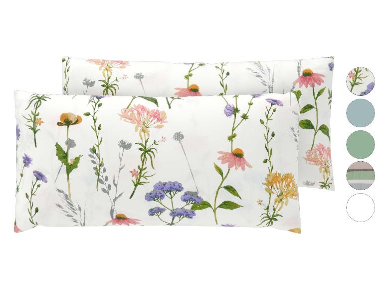 Kissenbezug mit farbenfrohem Blumenmuster und Farbmustern auf der rechten Seite.