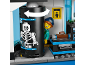 Spielzeug-Flughafensicherheits-Scanner mit rotierendem Zylinder, der ein Skelett und eine Minifigur zeigt.
