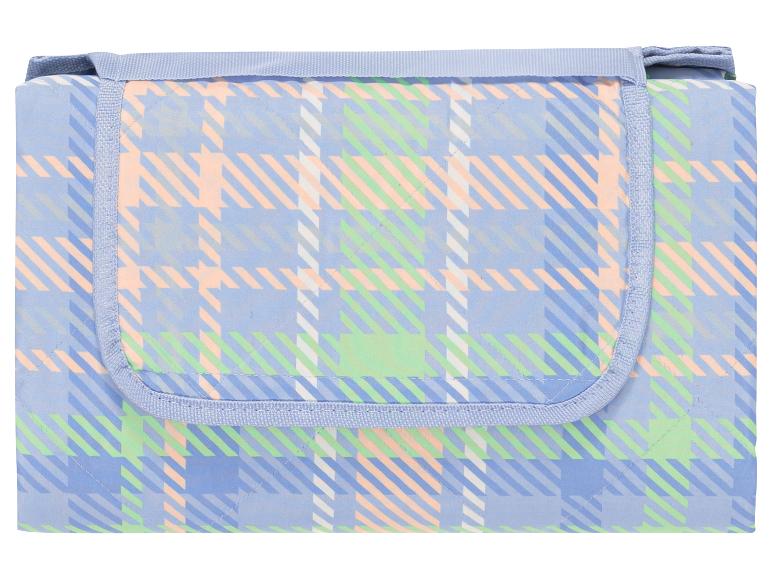 Faltbare Picknickdecke mit pastellfarbenem Karomuster.