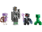 Vier Spielzeugfiguren im Pixel-Stil: ein lila Skelett, ein grauer Golem, ein schwarzer Krieger und ein grüner Creeper.