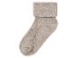 Beige Wollsocke mit geripptem Bund.
