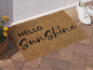 Eine Fußmatte mit der Aufschrift 'Hello Sunshine'