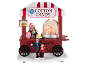 Dekorativer Zuckerwattewagen mit Figuren und der Aufschrift „Cotton Candy“.