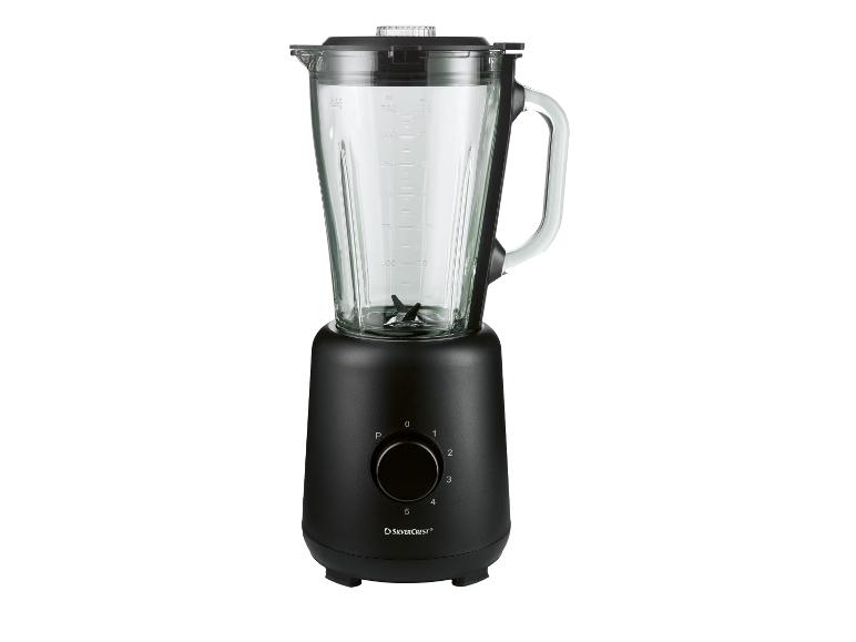 Schwarzer Mixer mit Glaskrug, ausgestattet mit einem Drehregler für Geschwindigkeitsstufen von 0 bis 5 und einer Pulsfunktion.