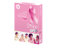 Rosa Büropapierpackung mit Brustkrebs-Bewusstseinsband und lächelnden Frauen.