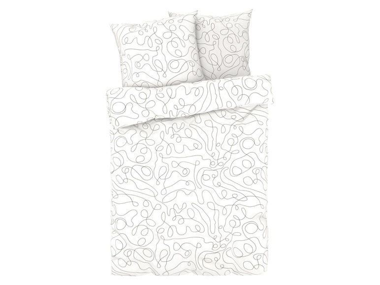 Ein weißer Bettbezug mit zwei Kissenbezügen, mit einem abstrakten Muster aus schwarzen Linien.