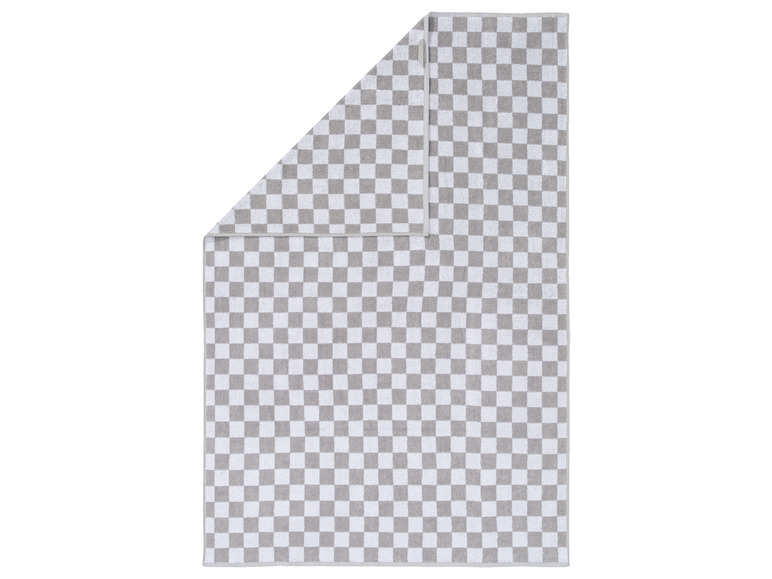 Ein graues und weißes Handtuch mit Karomuster.