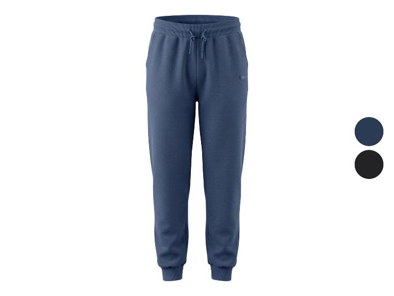 Herren-Jogginghose in Blau und Schwarz mit Kordelzug.