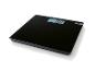 Schwarze Badezimmerwaage mit digitaler Anzeige, die „0.0 kg“ anzeigt.
