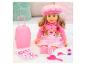 Blonde Puppe in Pink, mit Koffer und Accessoires.