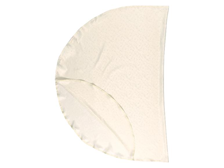 Cremefarbene Tischdecke mit Blumenmuster, in Viertel gefaltet