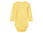 Gelber Strampler mit langen Ärmeln für Babys.