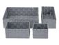 Vier graue Aufbewahrungskörbe aus gewebtem Material.