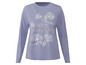 Ein hellblaues Langarmshirt mit Blumenmuster und dem Text 'I need my beauty sleep'.
