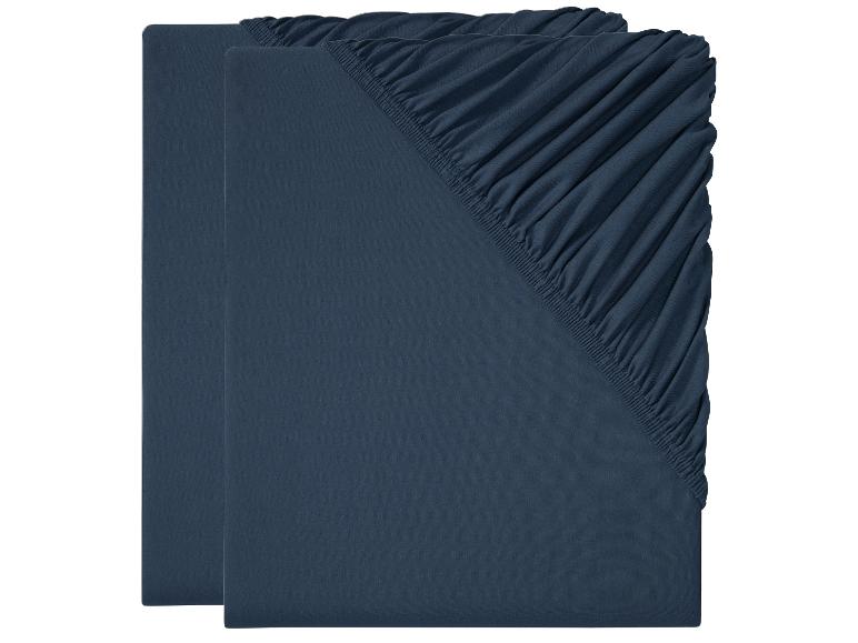 Zwei dunkelblaue Spannbettlaken.