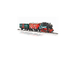 Weihnachtlicher Spielzeugeisenbahn mit Lokomotive und zwei Waggons auf Gleisen.