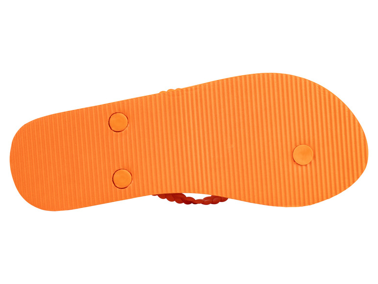 Die Unterseite eines orangefarbenen Flip-Flops.