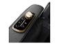 Bedienfeld eines Massagesessels mit Touch-Tasten und Drehregler.
