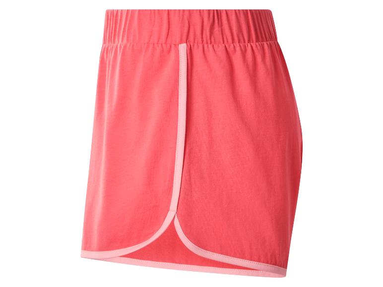 Korallenfarbene Damenshorts mit hellrosa Paspeldetails.