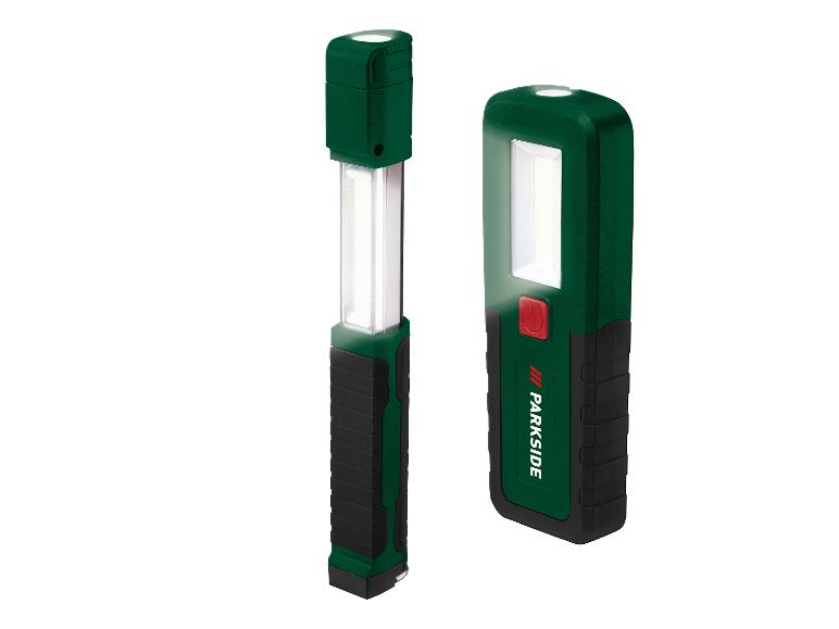 Zwei grüne und schwarze LED-Arbeitsleuchten, eine zylindrische und eine rechteckige, beide leuchtend.