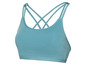 Hellblauer Sport-BH mit gekreuzten Trägern.