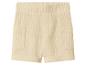 Beige Musselin-Shorts mit Gummizug in der Taille und Taschen.