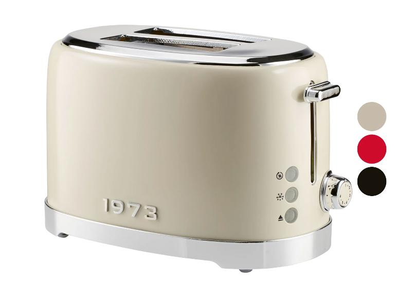 Ein cremefarbener Retro-Toaster mit Doppelschlitzen und Chromdetails, mit einem Bedienrad.
