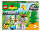 LEGO Duplo Jurassic World Spielset mit Dinosauriern, einem Baum und einer Figur.