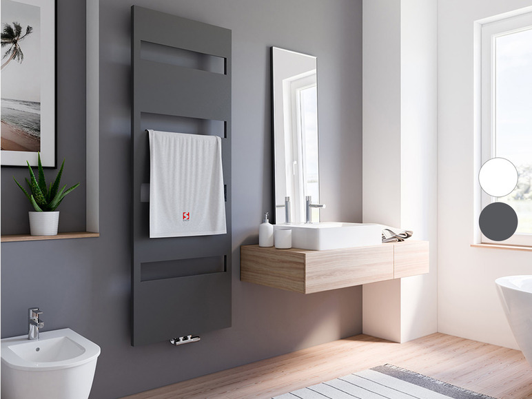 Ein Badezimmer mit einem dunklen Handtuchheizkörper, einem Waschbecken und einer Badewanne.