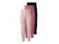 Drei Mädchen-Leggings: eine rosa mit Punkten, eine einfarbige rosa und eine einfarbige schwarze.