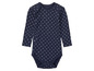 Ein dunkelblauer Baby-Body mit weißen Punkten.