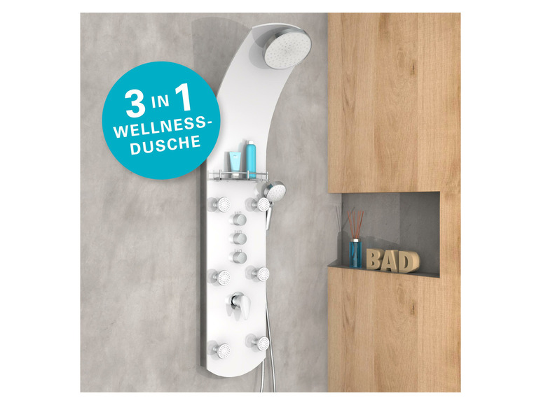 Ein weißer Duschkopf mit mehreren Düsen und einem Ablagefach für Duschprodukte.